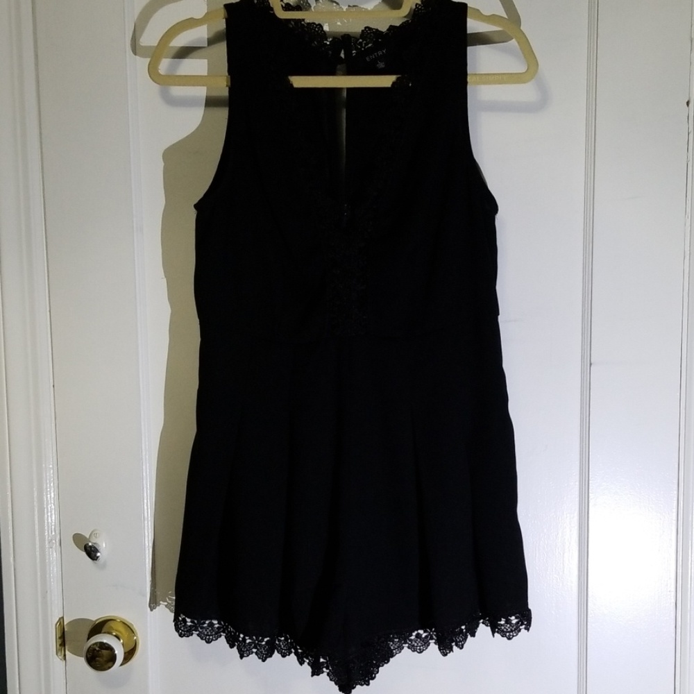 Black romper with lace detailing